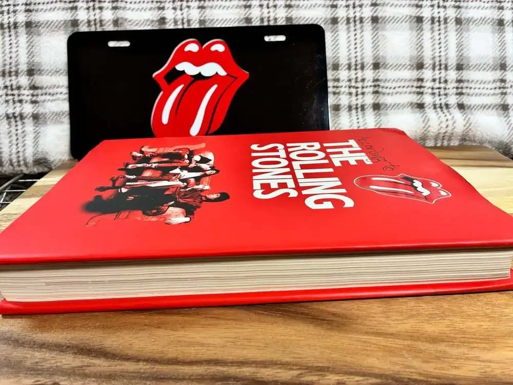 According To The Rolling Stones Hardcover Book And Metal License Plate